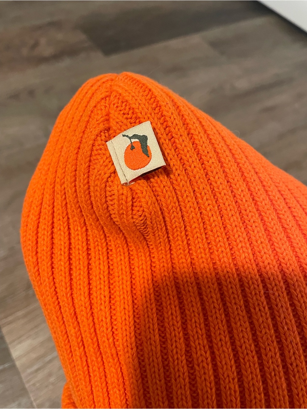 Bright Orange Ribbed Beanie with Fruit Logo